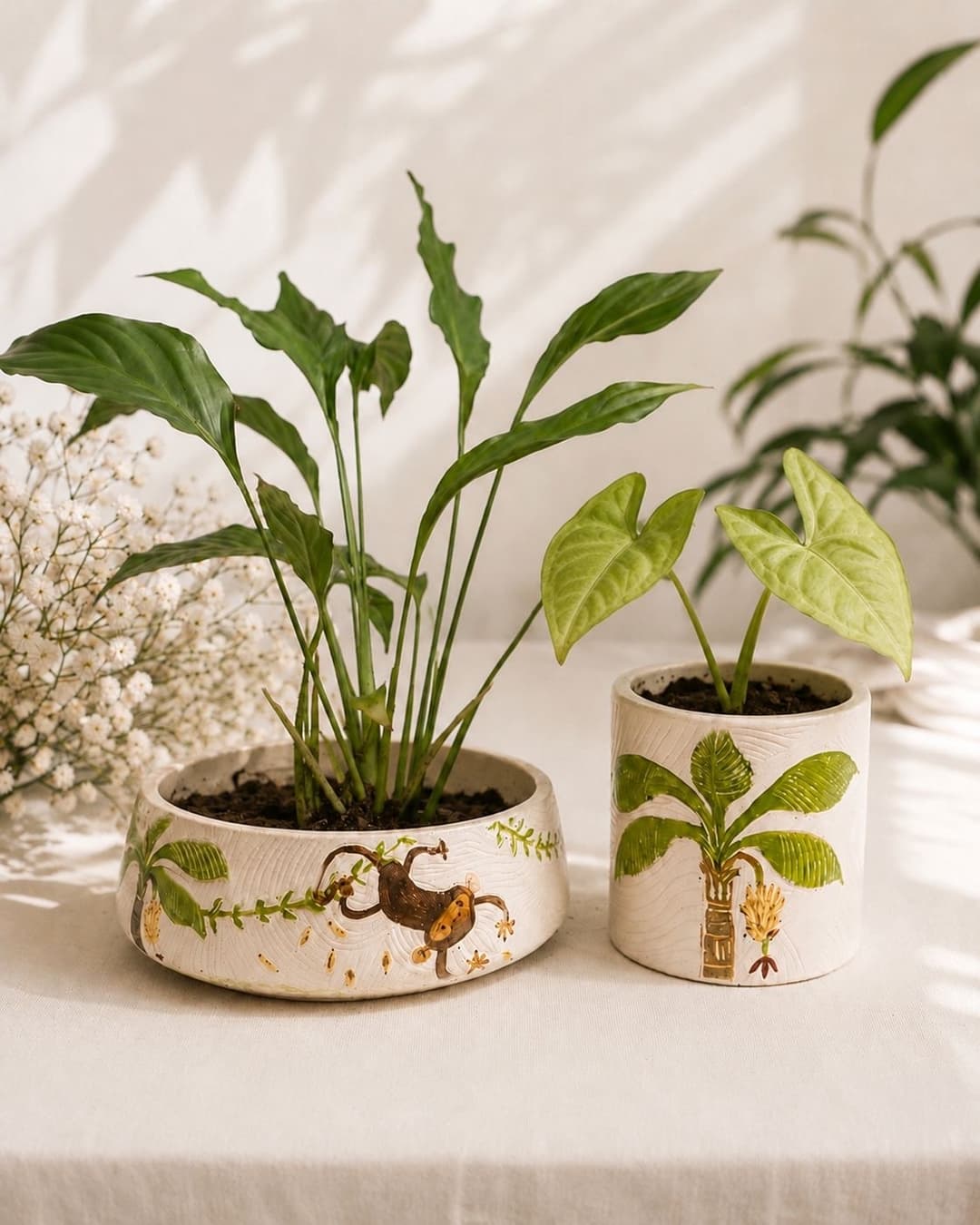 Ru's Jungle Story handcrafted concrete planters with peace lily and syngonium plants
